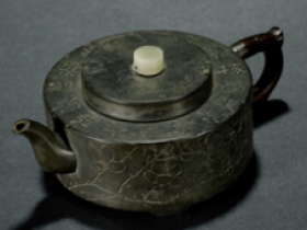 朱石楳刻锡包砂胎圆壶成交价