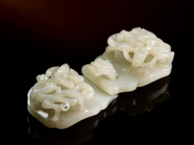 白玉雕螭龙纹带扣成交价